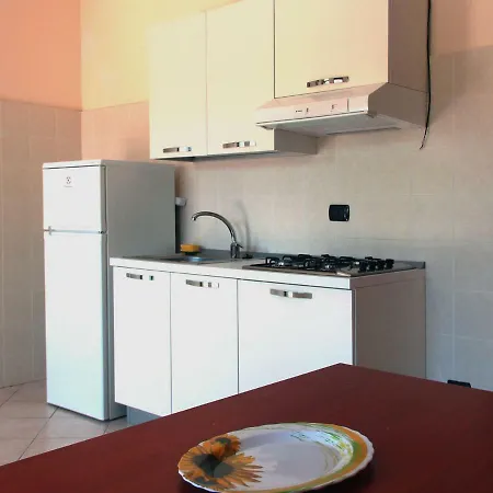 In Ξενοδοχείο με διαμερίσματα *